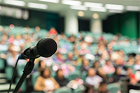 Microphone in a stadium full of people.