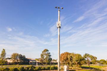 Image of a telecommunication structure near a housing area