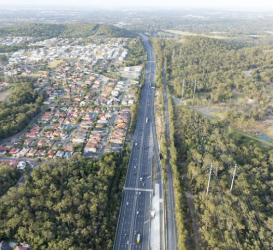 Aerial shot of residential area and motorway in Brisbane Queensland.