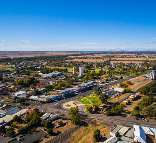 Aerial view of a suburb with a blue sky.
