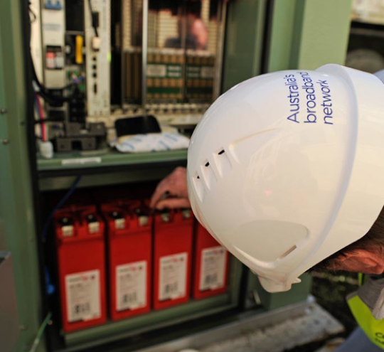 Person looking in an electric box