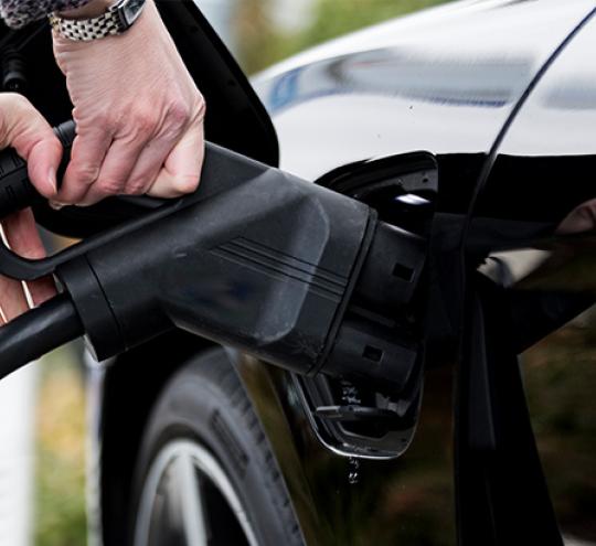 Electric car being charged.
