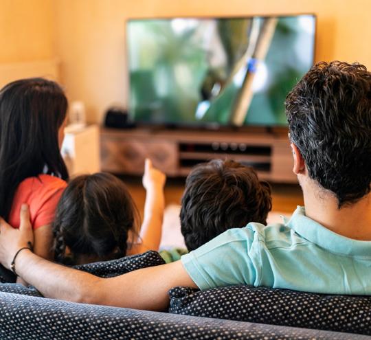 family watching television