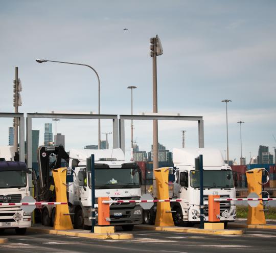 Trucks entering freight facility.