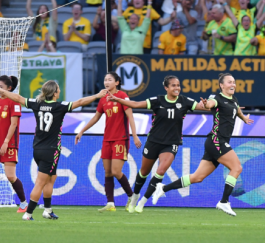 Five professional football players in a match.
