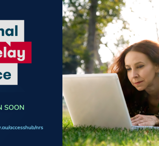 Woman wearing hearing aid watching the screen on her lap top while typing on the key board outdoors. Text reads: National Relay Service OPENING FOR REGISTRATION SOON communications.gov.au/accesshub/nrs.