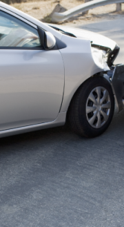 Car crash between two cars on the road