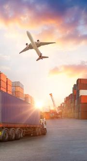 An image showing how freight can be transported over different modes, including road, rail, air, and sea. There are big cargo containers featured prominently.