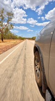 Car driving along an Outback highway