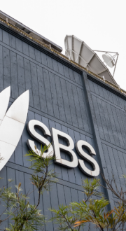 Image of the SBS logo attached to the SBS building.
