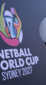 The Netball World Cup trophy sitting in front of a branded Netball World Cup Sydney 2027 backdrop.