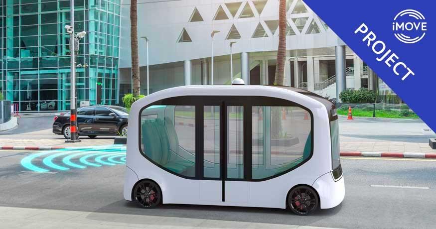 imove image of a small electrical vehicle in front of a building.