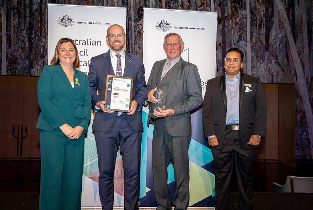 Hawkesbury City Council accepting their award for Disaster Readiness and Recovery from the Hon Kristy McBain MP, Minister for Regional Development, Local Government and Territories and Minister for Emergency Management