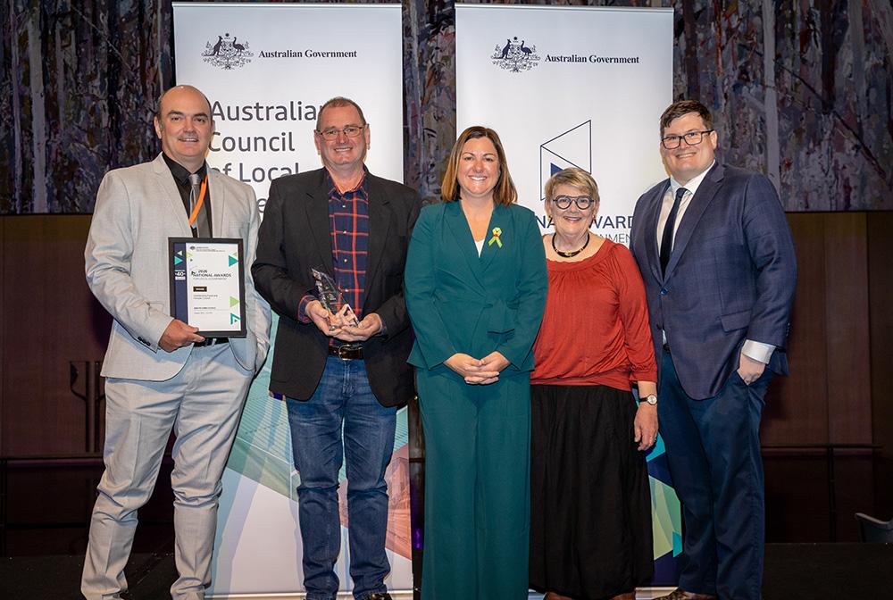 Quilpie Shire Council accepting their award for Outstanding Rural and Remote Council from the Hon Kristy McBain MP, Minister for Regional Development, Local Government and Territories and Minister for Emergency Management