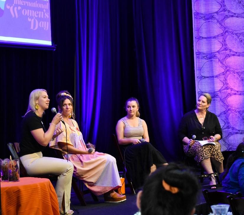 Photo of 4 women at a conference speaking on a panel. Photo credit: Katherine Town Council, NT