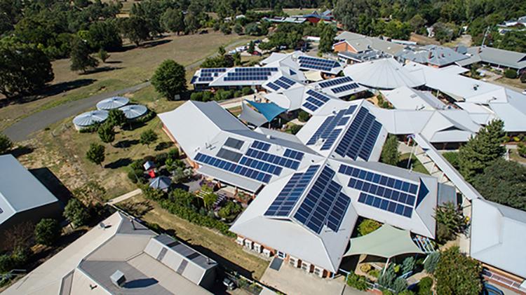 Photo showing solar panels on the roof of a community health service building in Yackandandah, Victoria.